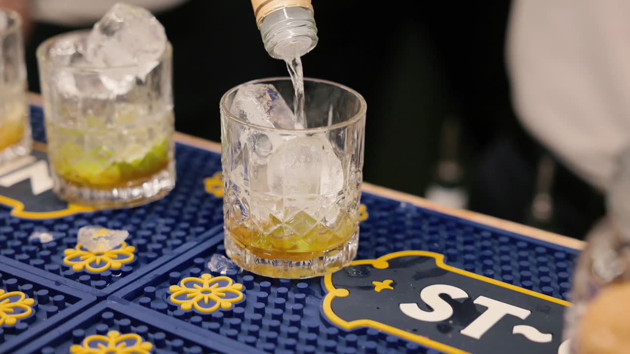 Cocktails being poured at the bar