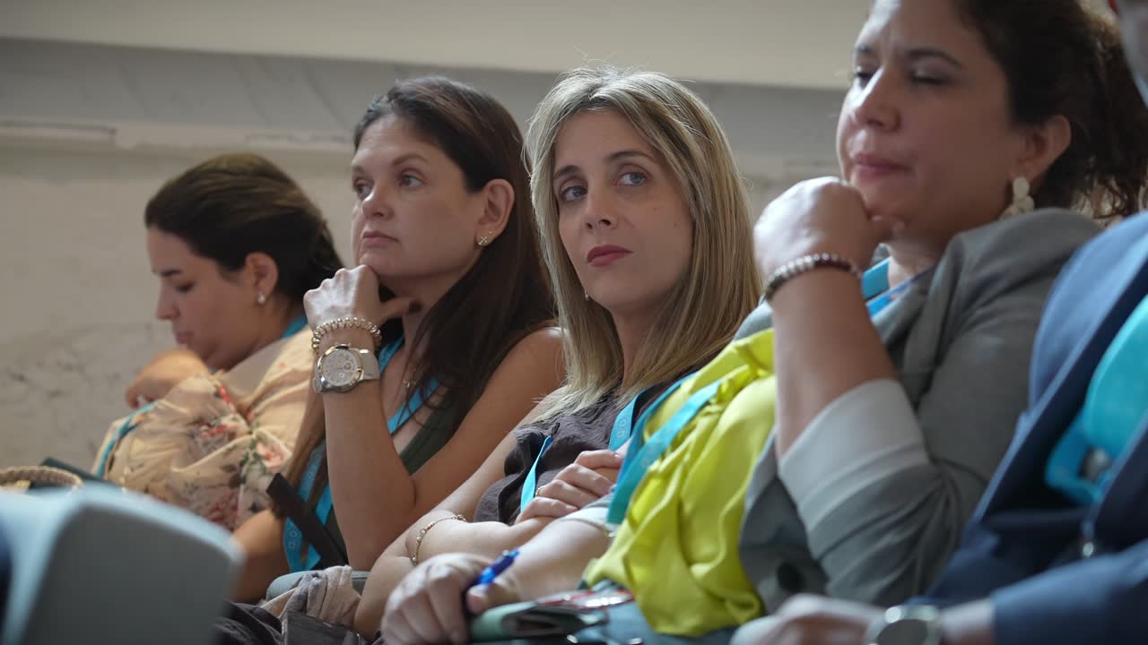 Attendees listening